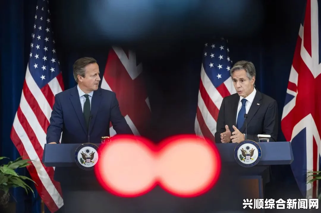 英国首相卡梅伦与伊朗总统鲁哈尼举行历史性会面